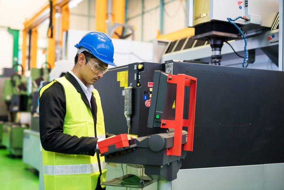 Someone in a factory working in the manufactoring and production business