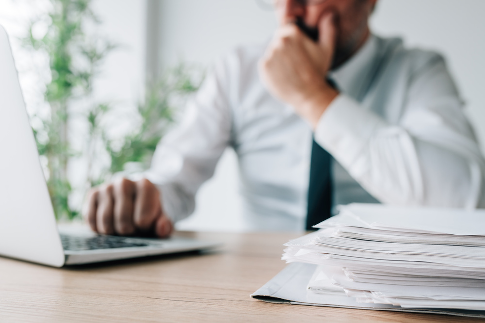 A man looks at his company website