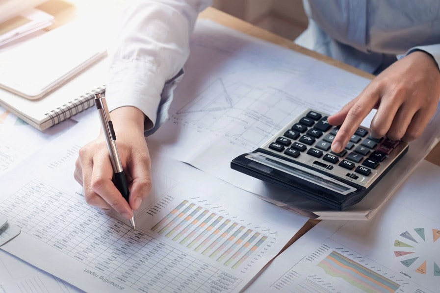 Accountant uses calculator