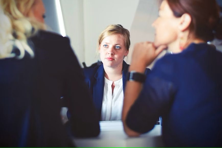Three women have a meeting