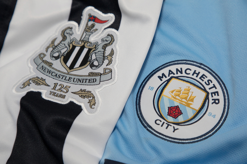 Newcastle United FC logo and Manchester CIty FC logo
