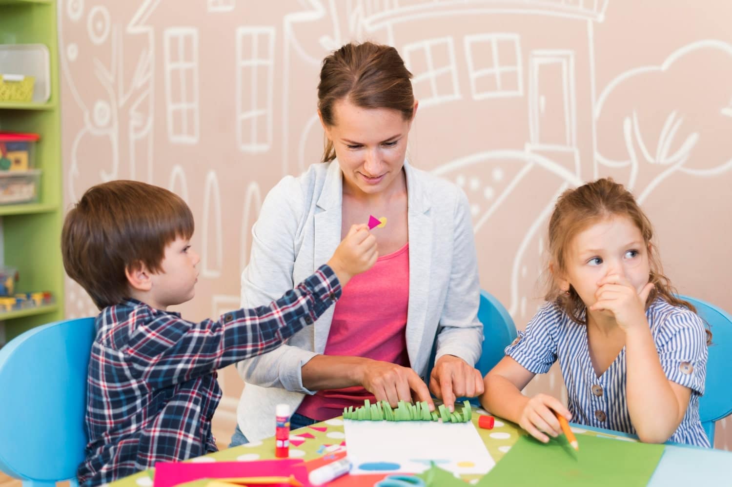 preschool teacher with students