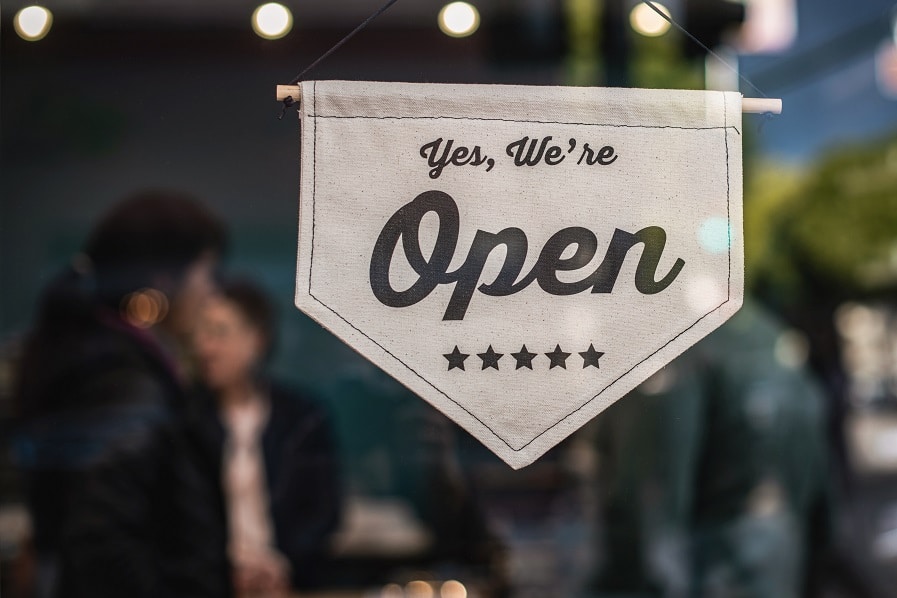 "open for business" sign