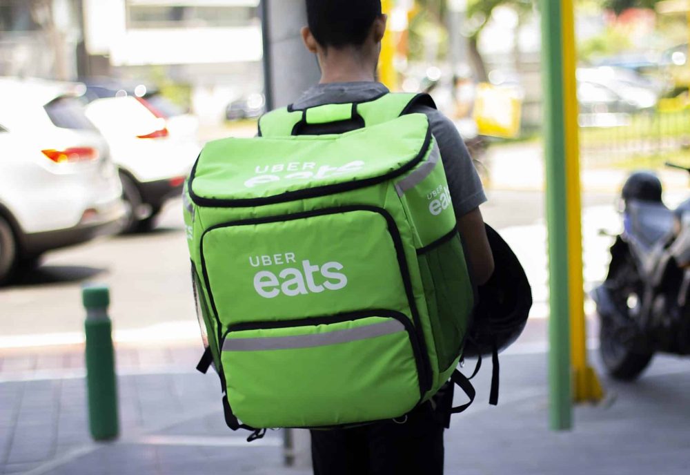Uber eats worker walking in the streets