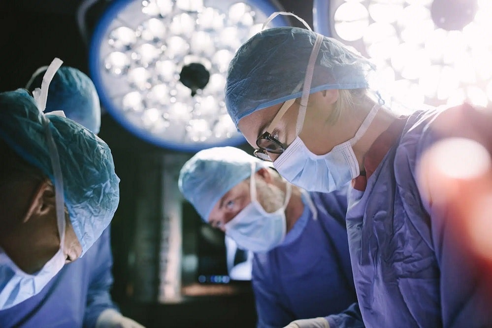 Surgeons carrying out an operation
