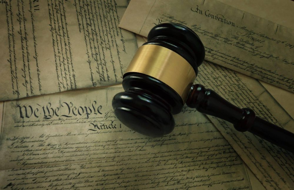 Court gavel on pages of the US Constitution