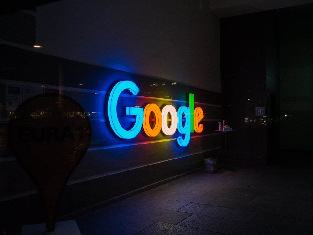 Google company sign illuminated at the entrance of google branch in Zurich, Switzrland