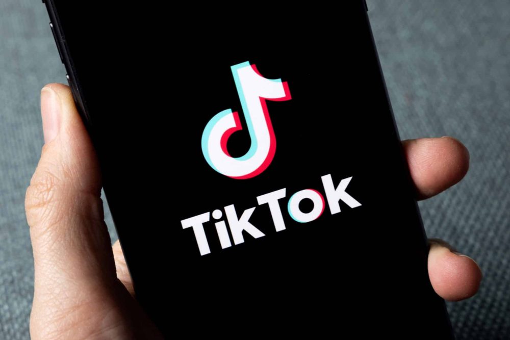 TikTok app icon on phone screen