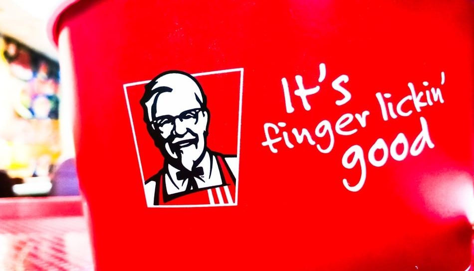 KFC bucket with thier slogan finger kickin good on it