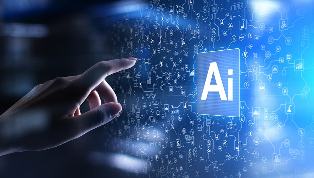 Blue artificial intelligence logo with a person's hand reaching towards it