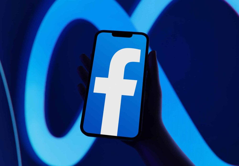 Facebook Meta logo on a phone