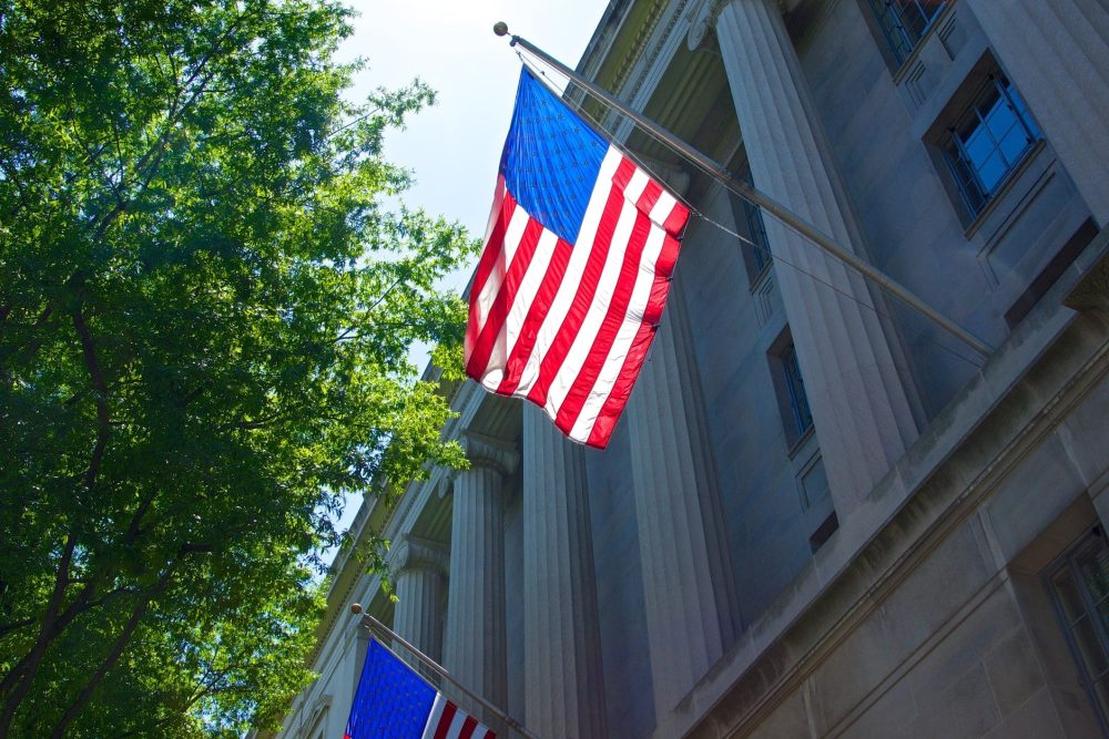 US Flag on Department of Justice building