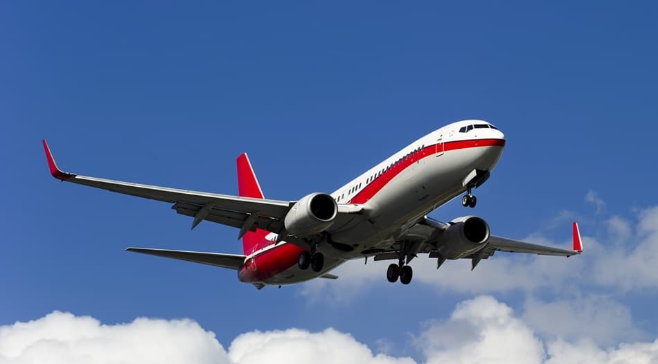 A Boeing 737 flying in the clouds