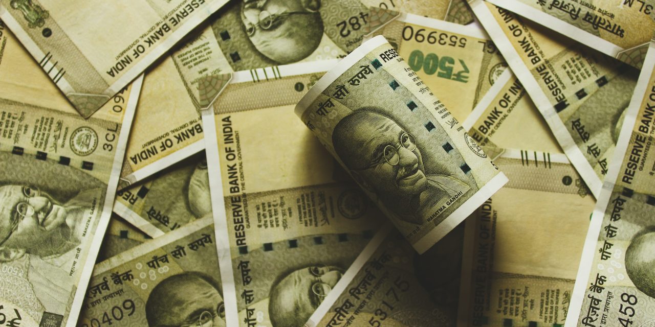 Rupee slides 14 paise against US dollar