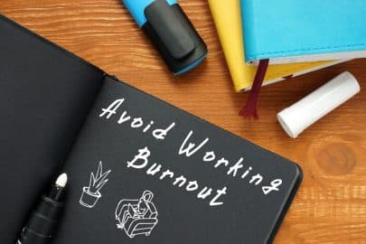 Notepad that says Avoid Working Burnout