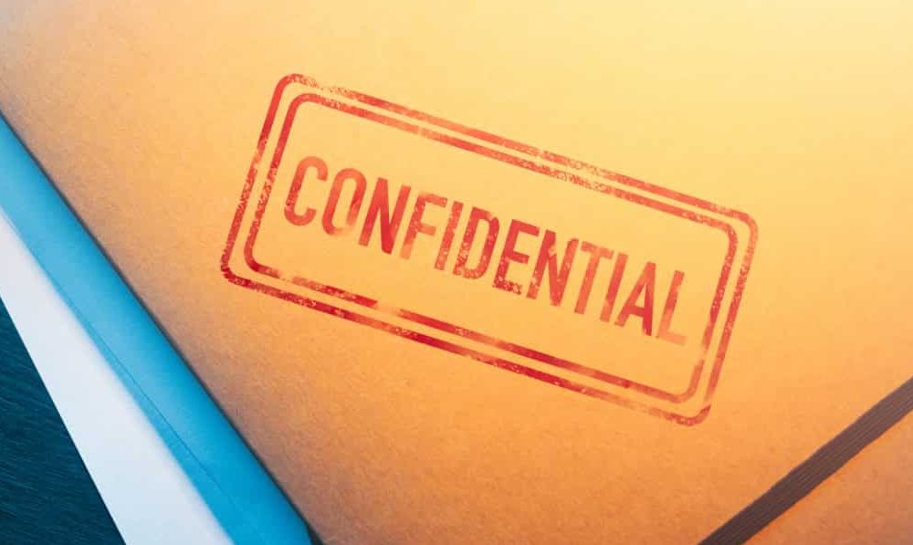 Folder which says confidential on it
