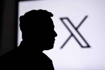 Silhouette of Elon Musk and the background of social media platform X
