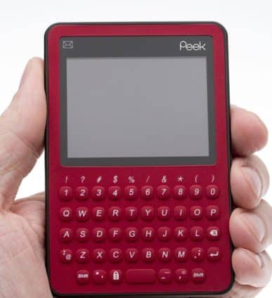 A person holds a Twitter Peek Device