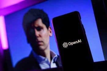 OpenAI logo and Sam Altman in background on screen