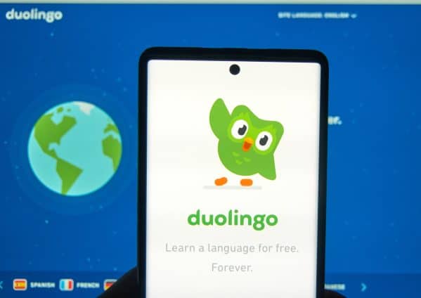 Duolingo logo and application on a phone