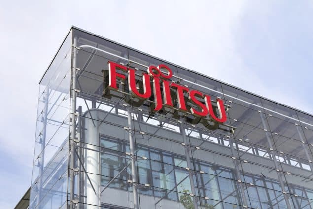 Fujitsu company logo on headquarters building