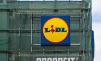 Lidl sign on the wall of a warehouse.