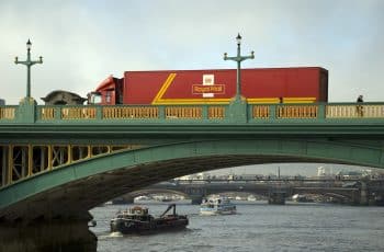 Royal Mail truck crossing Southwark Bridge in London.