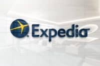 Expedia sign on glossy office wall