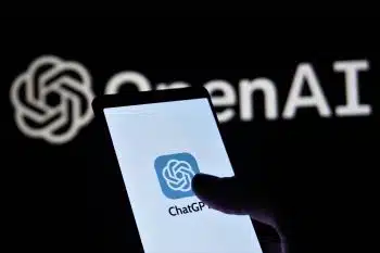 ChatGPT on mobile phone and OpenAI on background