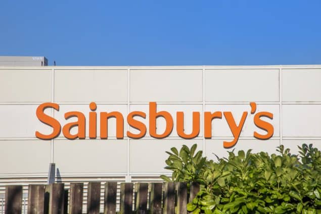 Sainsbury's supermarket sign on the side of a building