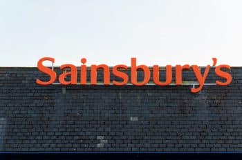 Sainsbury`s supermarket logo as a rooftop sign