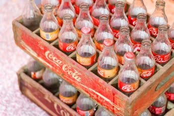 A crate of vintage Coca-Cola bottles