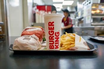 A tray of Burger King Food with burgers, a drink and fries